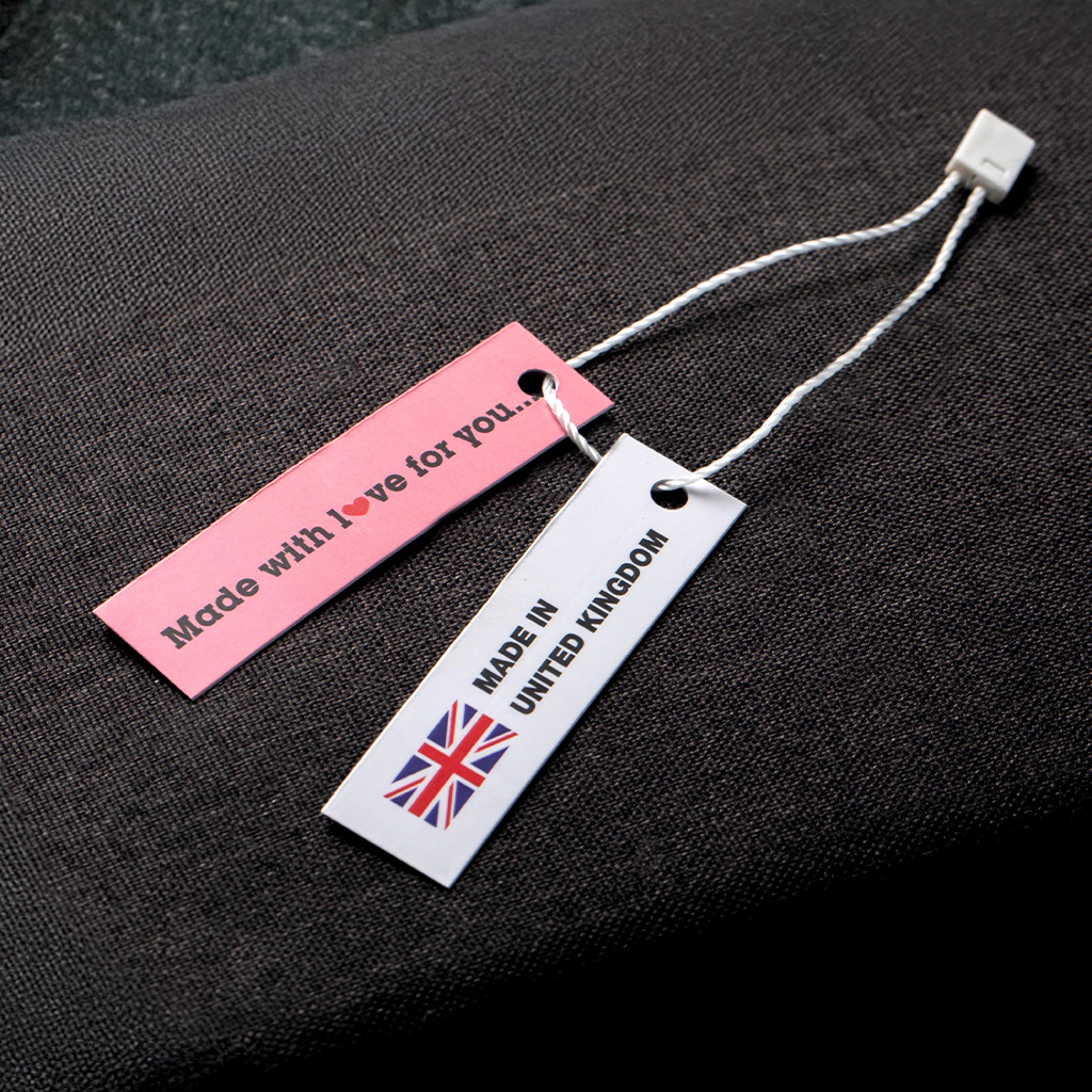Pink fabric label with string