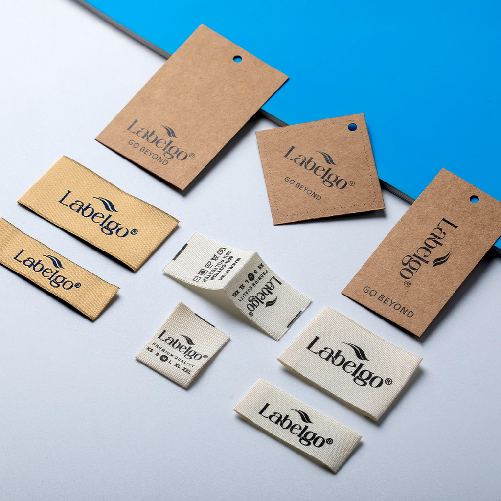 Brown kraft hang tag labels arranged on blue background.